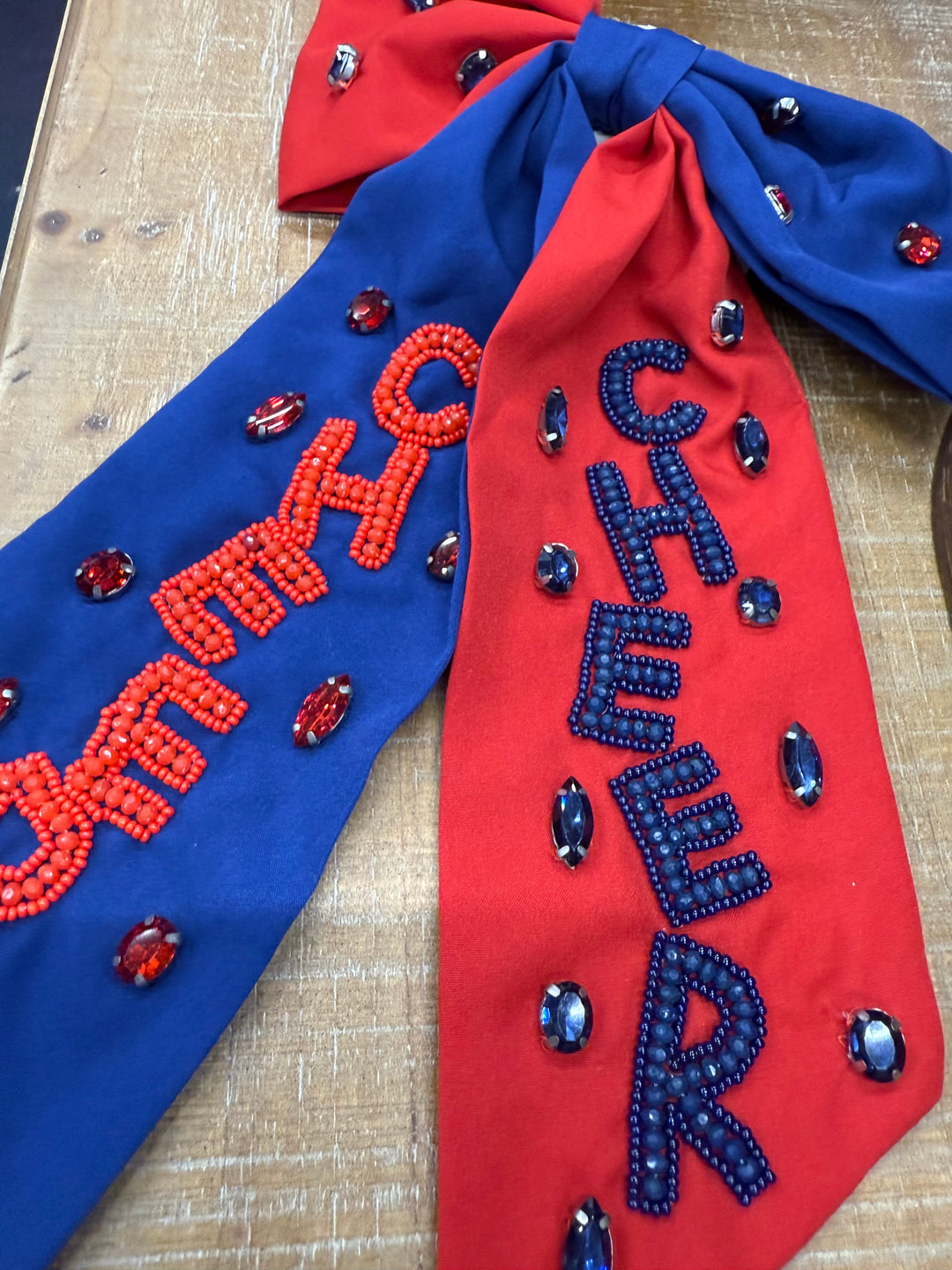 Blue and red 'CHEER' Bow